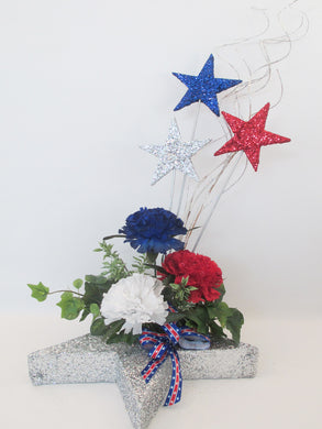 Patriotic stars, red,white & blue flowers centerpiece - Designs by Ginny