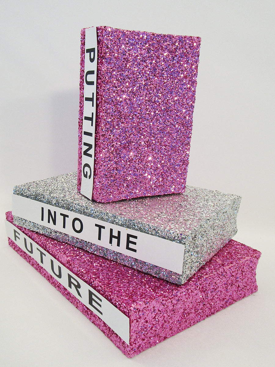 Pin book made from an old CD holder. Glitter felt to keep it classy.