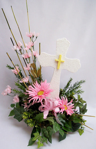 Pink cross centerpiece with white & pink lilies & other cross centerpieces