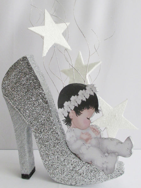 Baby on high heeled shoe centerpiece