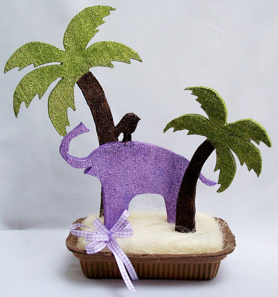 Baby shower centerpieces with butterflies, elephant, palm trees,baby silhouttes,flowers etc.