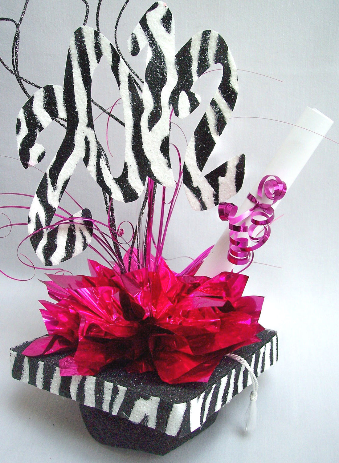 Zebra graduation mortar board hat centerpiece