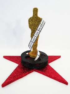 Oscar on star and film reel centerpiece - Designs by Ginny